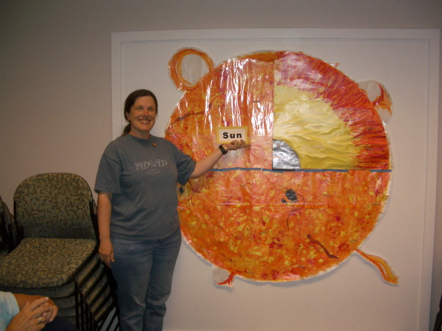 Dr. Judy Meyer and her solar model