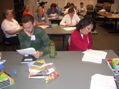 Gavin Rayner and Manju Newa Shrestha are engrossed in the play.