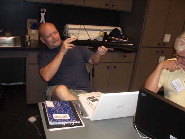 Mike F examines an IYA Galileoscope.