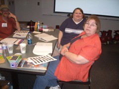 Kathryn and Bronwyn listen intently