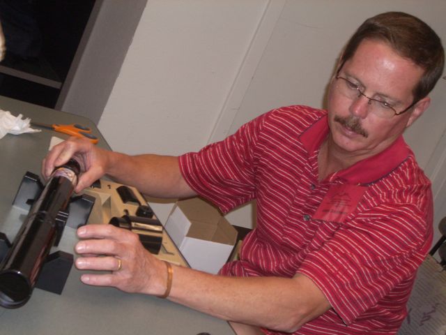 John Dickinson checks the instructions