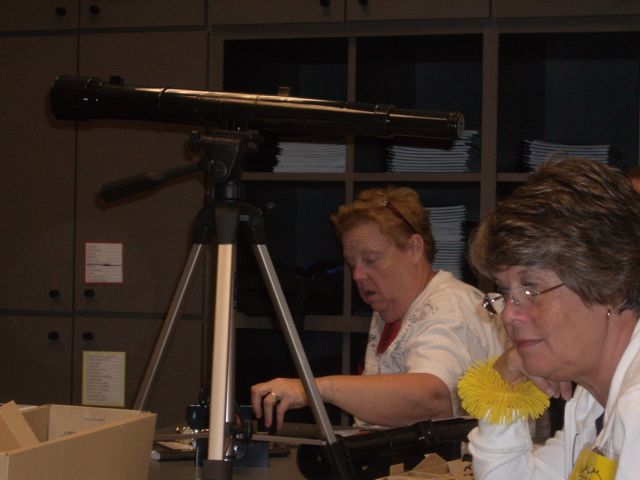 Linda and Louann are pleased with their new telescopes