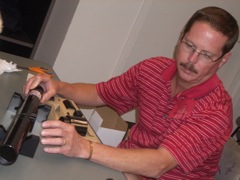 John Dickinson checks the instructions