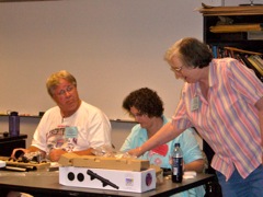 Warren and Theresa get a pointer from Dr. Hemenway